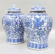 A Pair of Chinese Porcelain Jars & Covers, Kangxi style but 20th century, painted in underglaze blue