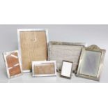 A Collection of Six Assorted Silver-Mounted Photograph-Frames, five plain oblong, 18.5cm wide by
