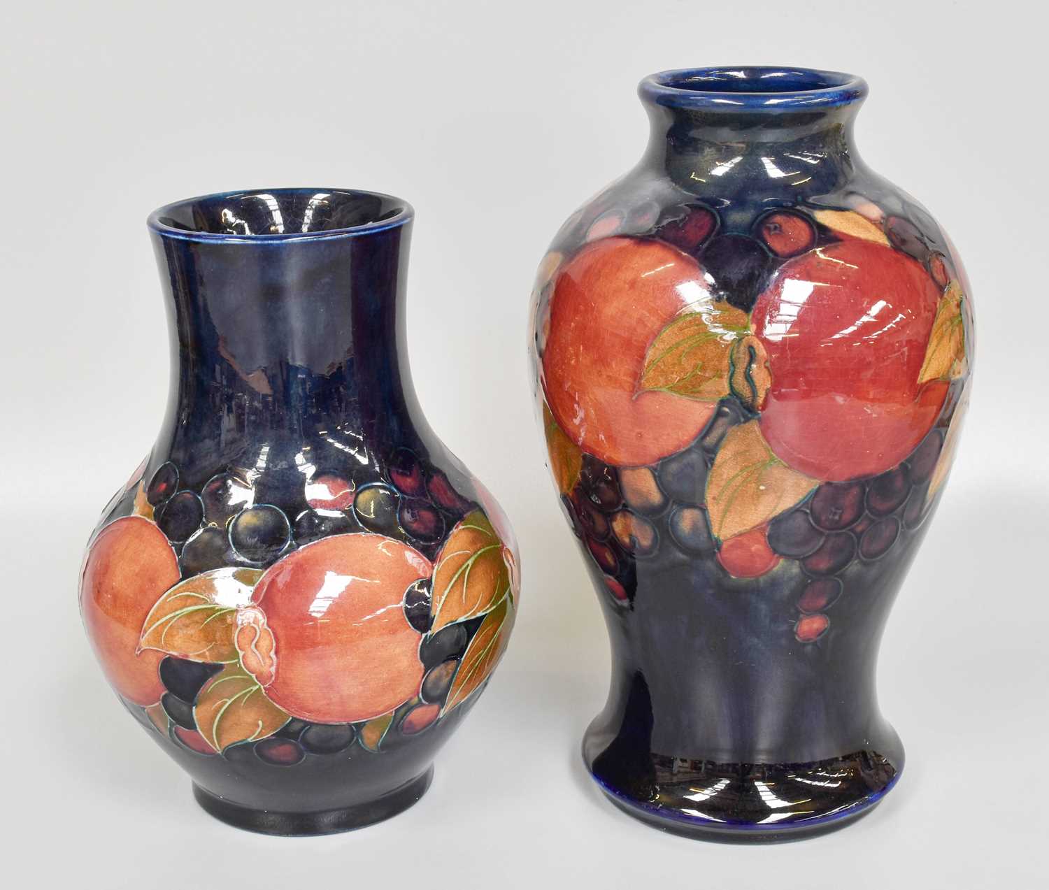 A William Moorcroft "Pomegranate" Pattern Vase, impressed marks and painted signature, 21cm high,