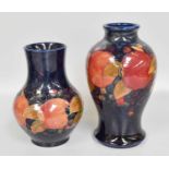 A William Moorcroft "Pomegranate" Pattern Vase, impressed marks and painted signature, 21cm high,