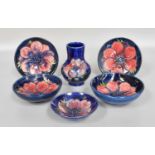 Six Walter Moorcroft "Anemone" Pattern Items, comprising: a vase, two coasters and three small