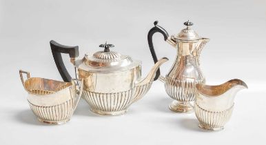 A Three-Piece Edward VII and George V Silver Tea-Service, by Horace Woodward and Co. Ltd., London,