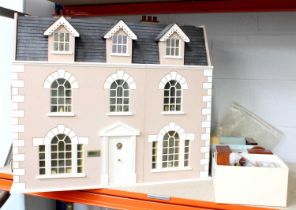 A 20th Century Doll's House, three storey with furnitures and accessories (qty)