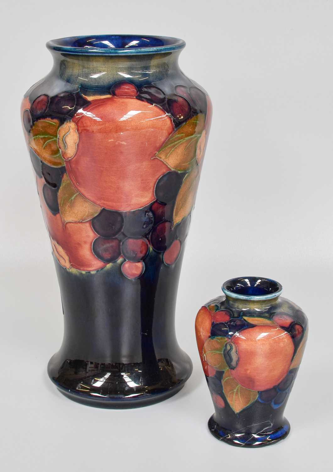 A William Moorcroft "Pomegranate" Pattern Vase, impressed marks and painted signature, 22cm high,