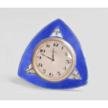 A George V Silver and Enamel Timepiece, by Albert Carter, Birmingham, 1925, shaped triangular and