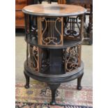 An Early 20th century Mahogany Revolving Bookcase, of cylindrical form with pierced gilt metal