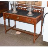 A Late 19th century Mahogany Writing Desk, galleried back, three drawers, turned supports, 108cm