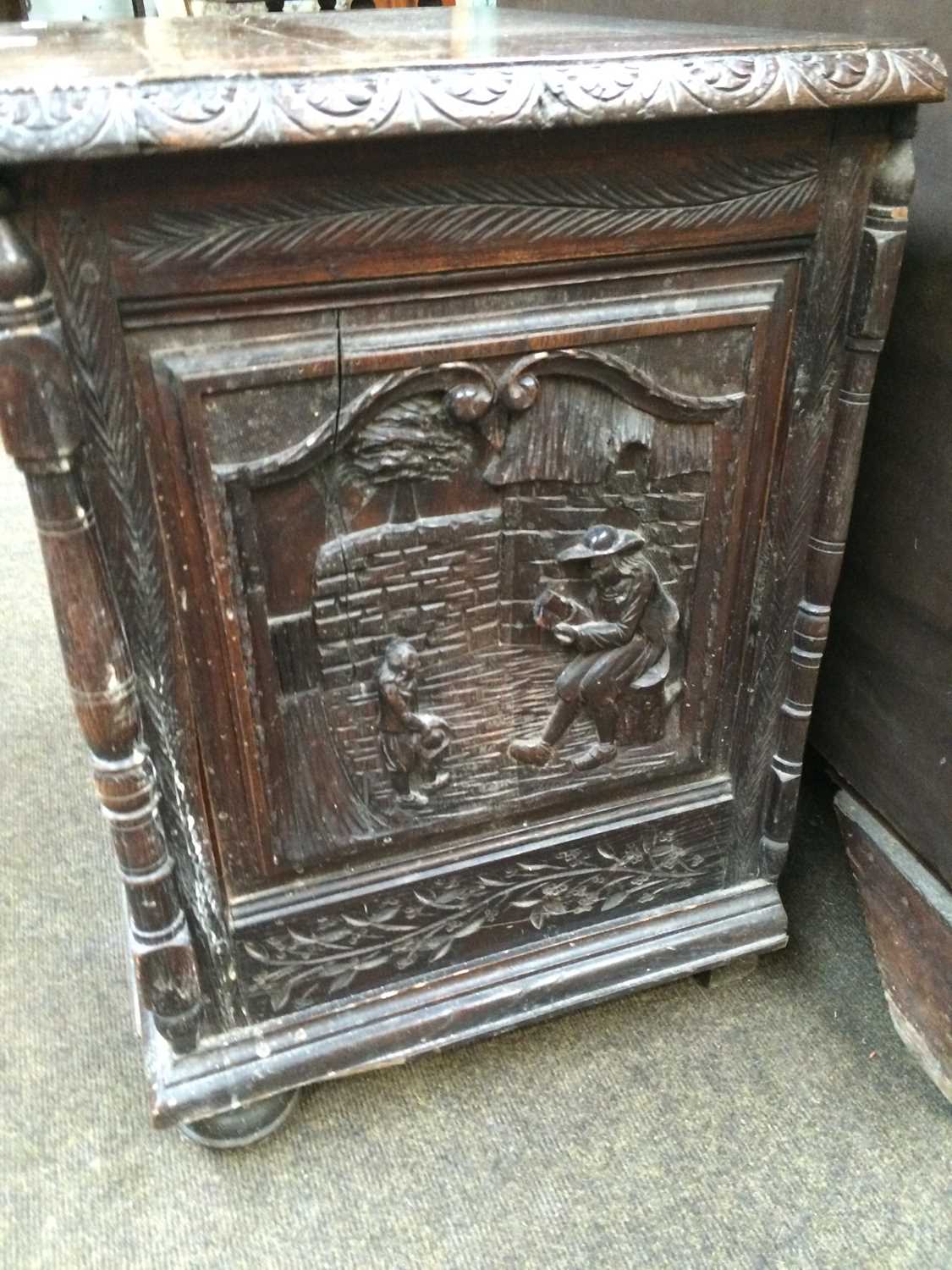 A Carved Oak Chest, some earlier timbers, with hinged lid, elaborate figural panels to the front and - Image 7 of 8