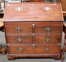 A 19th Century Camphor Wood Campaign Bureau, with fall flap, fitted interior, brass mounts, four