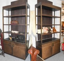 A Pair of Substantial Stained Wood Brushed Metal and Brown Leather Bookcases, the four open tiers