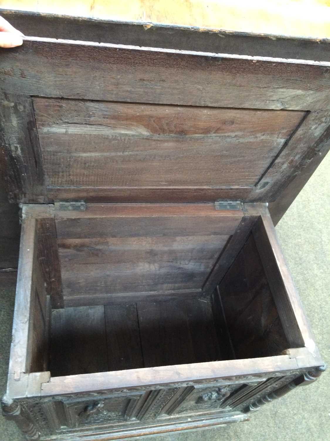 A Carved Oak Chest, some earlier timbers, with hinged lid, elaborate figural panels to the front and - Image 8 of 8