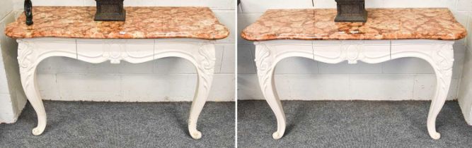 A Pair of French Style Marble Topped Console Tables, white painted bases with shaped aprons to