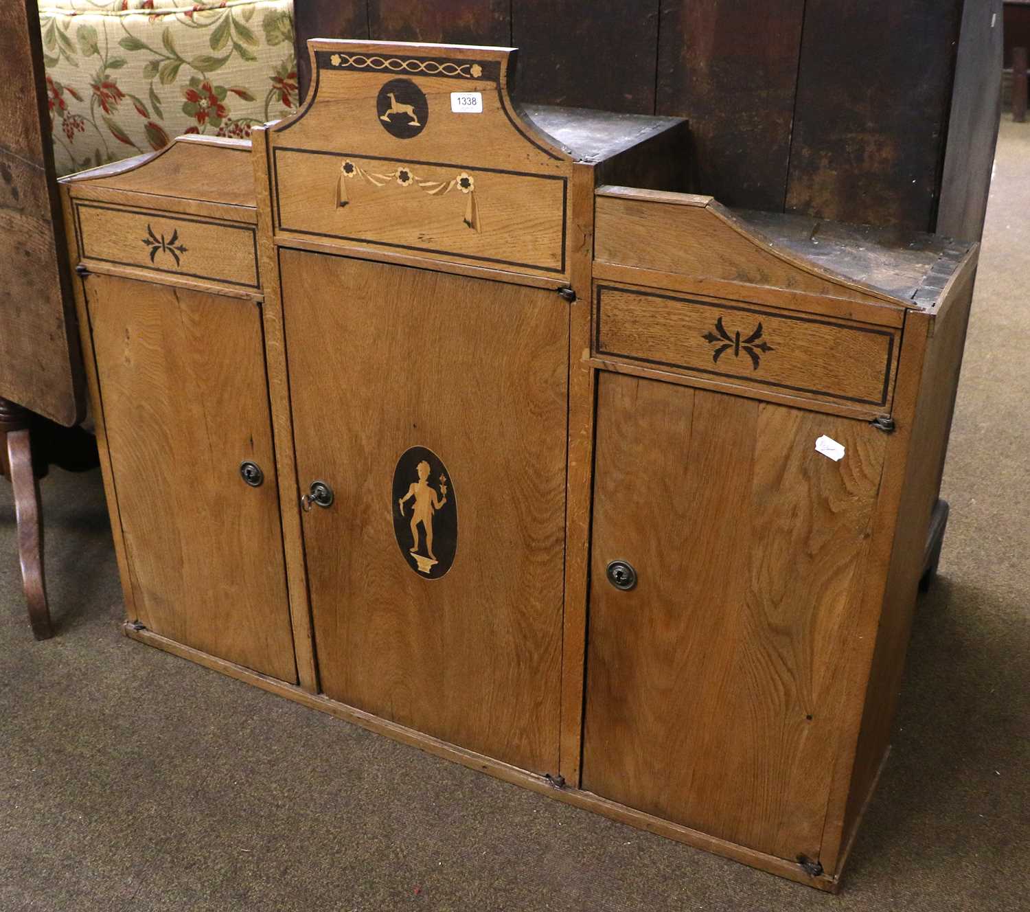 A 19th century Continental Light Oak & Inlaid Cabinet Top, shaped pediment over stylised panels