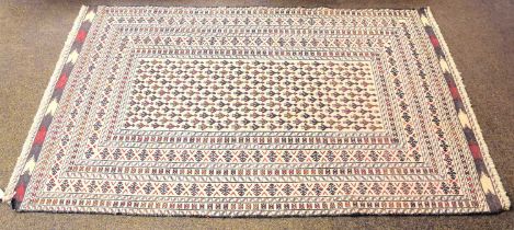 Afghan Flat Weave Rug, the cream field with anthropomorphic devices enclosed by multiple borders,