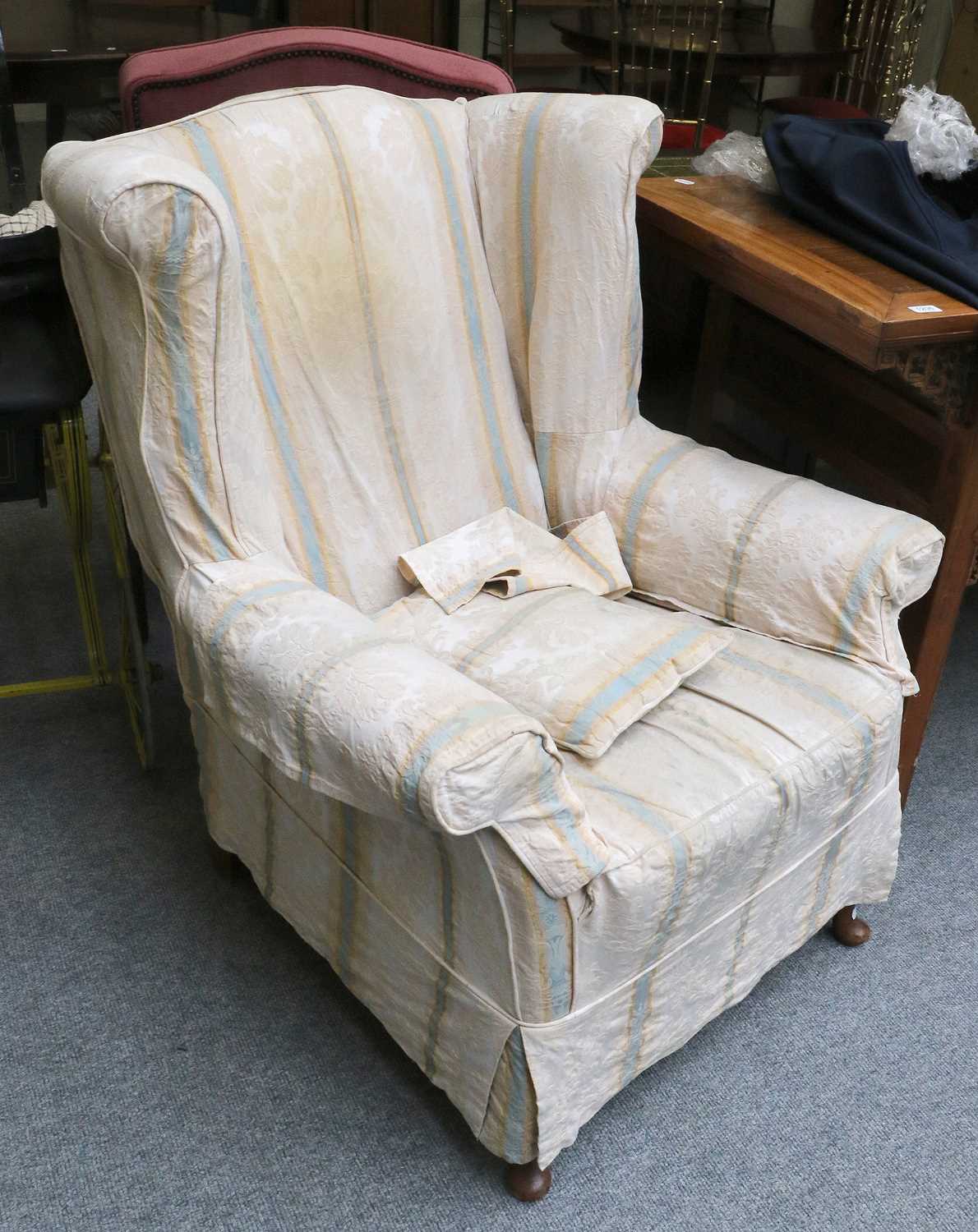 A Pair of Mahogany Framed Wing Back Armchairs, early 20th century (in need of restoration), raised - Bild 3 aus 3