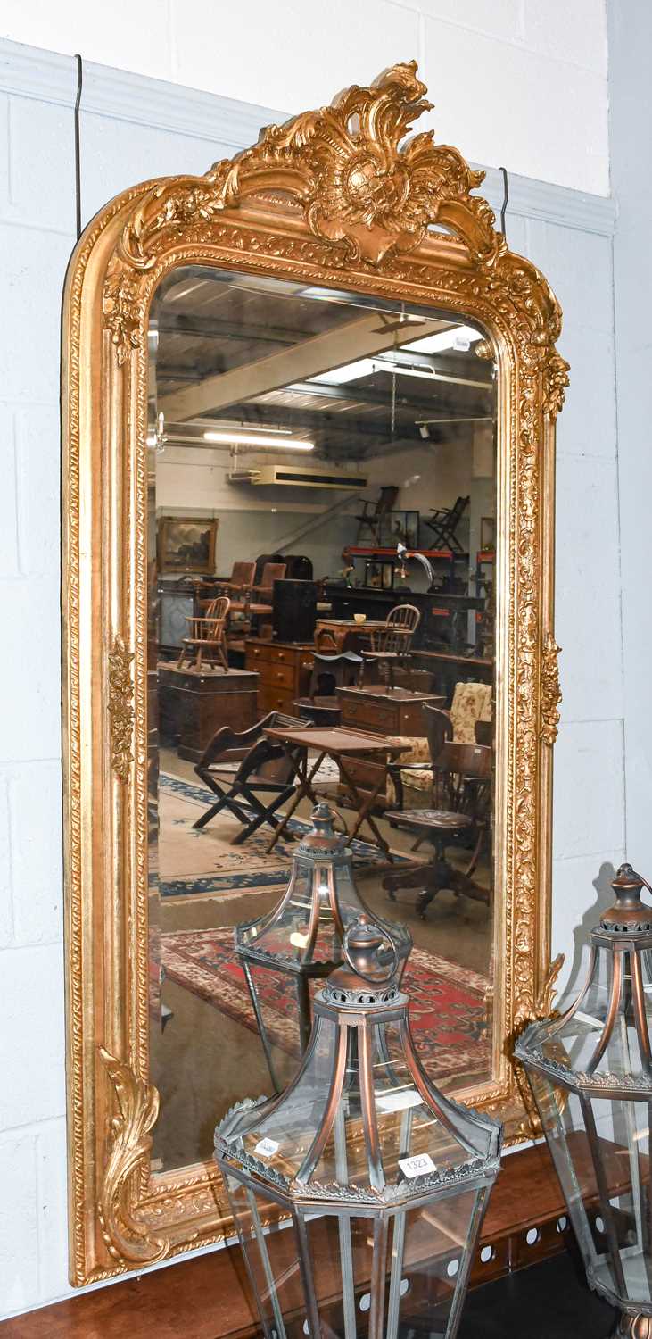 A 20th century Giltwood Mirror, pierced foliate scroll pediment, bevelled plate within moulded