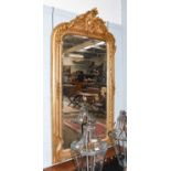 A 20th century Giltwood Mirror, pierced foliate scroll pediment, bevelled plate within moulded