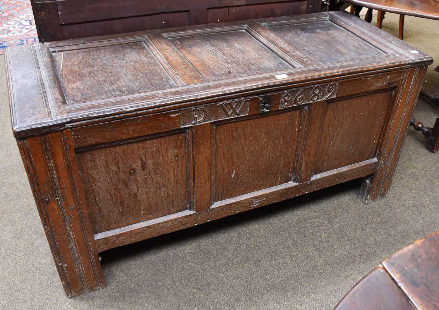 A Late 17th Century Oak Panelled Coffer, dated 1689, initialled D.W, hinged lid, moulded stile ends,