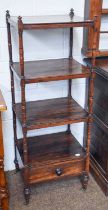 A Regency Rosewood Four Tier Whatnot, turned supports, single drawer to base on, castors, 126cm by
