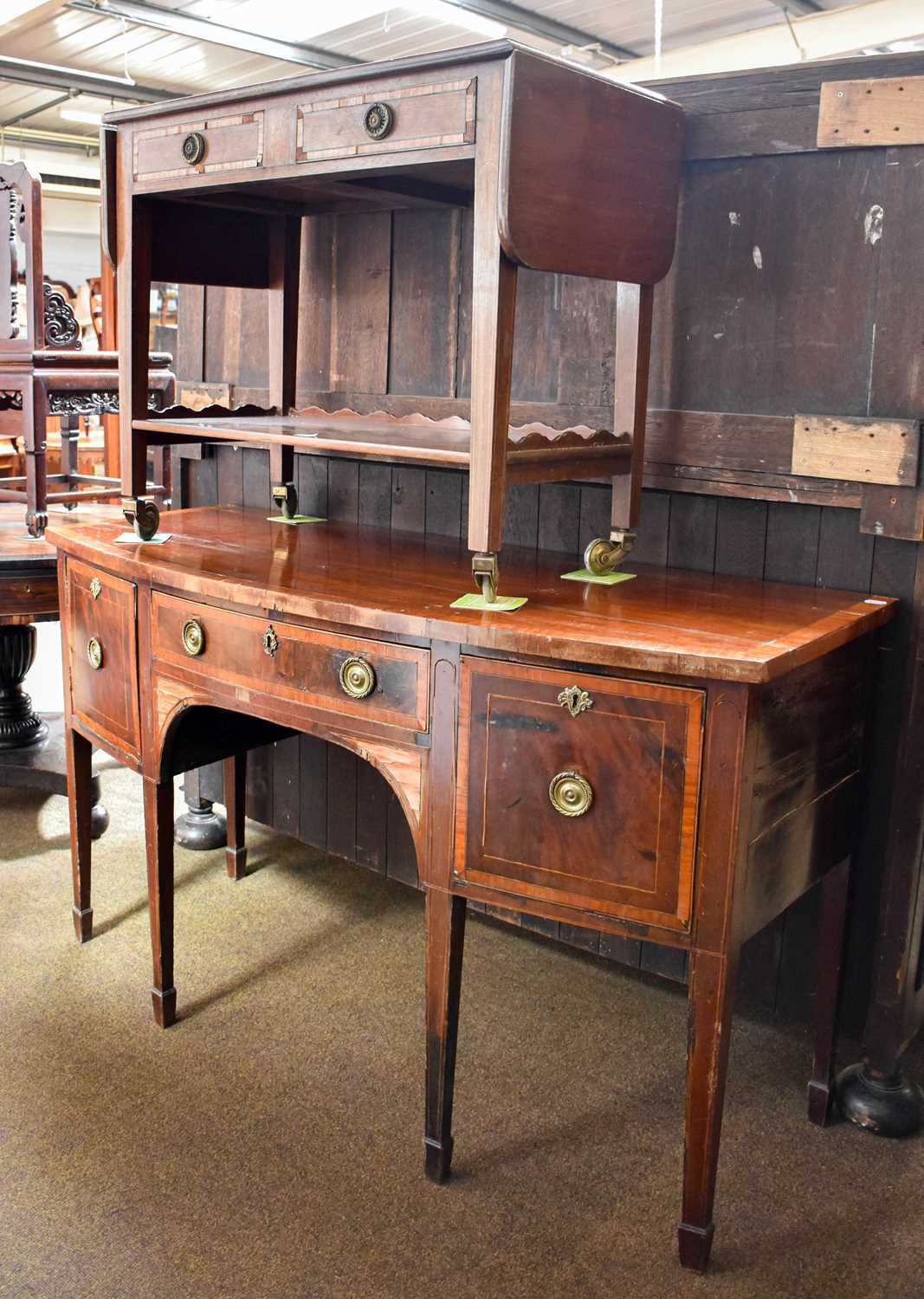 A Georgian Style Mahogany Drop Leaf Tea Trolley, on castors, together with an early 19th century