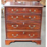 An Early 19th century Mahogany Chest of Four Long Drawers, brass swan neck handles, bracket