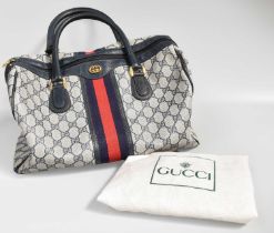 Gucci Blue Monogram Bag with blue and red webbing detail, twin handles, blue leather type mounts,