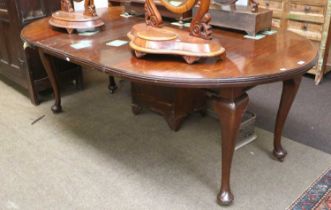 A Mahogany Wind Out D-End Dining Table, with two additional leaves (no winder) raised on cabriole