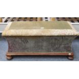 A Victorian Mahogany Framed Ottoman with upholstered hinged seat and sides, on plinth base with four