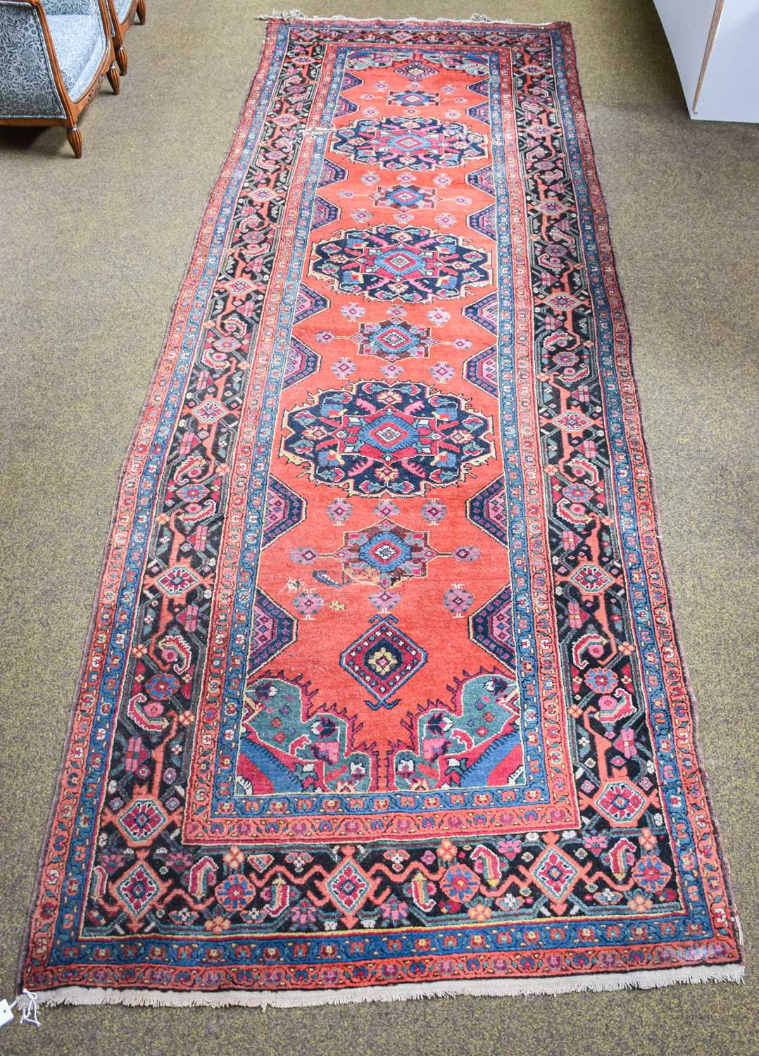 Azeri Long Rug, the rich terracotta field with three flowerhead medallions enclosed by charcoal - Bild 2 aus 2