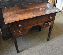 An 18th century Oak Lowboy, rectangular top over one long and two short drawers with square