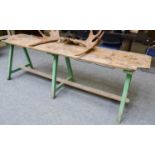 A 19th Century Pine Plank Top Trestle Table, on painted green legs, 75cm by 247cm by 57cm The