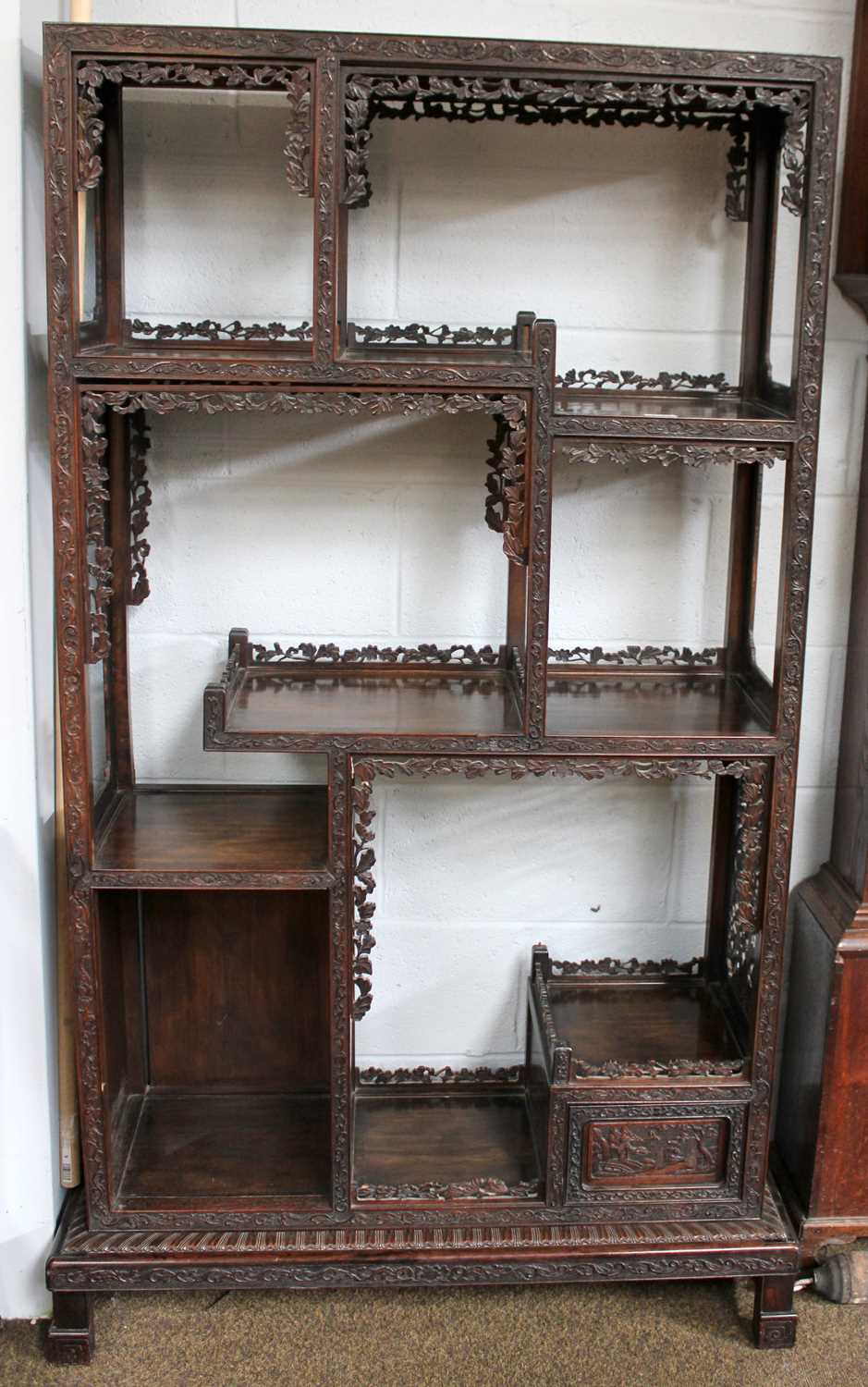 A Chinese Export Carved Hardwood Display Cabinet, early 20th century, the framework carved as a - Image 12 of 12