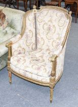 A 19th century French Louis XVI Painted and Giltwood Armchair, upholstered back, arms and seat