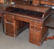 A 1920's Roll Top Pedestal Desk, by WM. Richardson, Leeds & Bradford, fitted interior, 122cm by 74cm