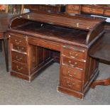 A 1920's Roll Top Pedestal Desk, by WM. Richardson, Leeds & Bradford, fitted interior, 122cm by 74cm