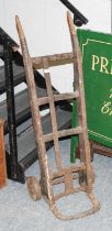 A Late Victorian Porter's Sack Barrow, stamped Watkins; together with a pine apple tray rack,