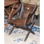A Victorian Parquetry Inlaid Oak Glastonbury Chair, solid back and seat, on X-frame