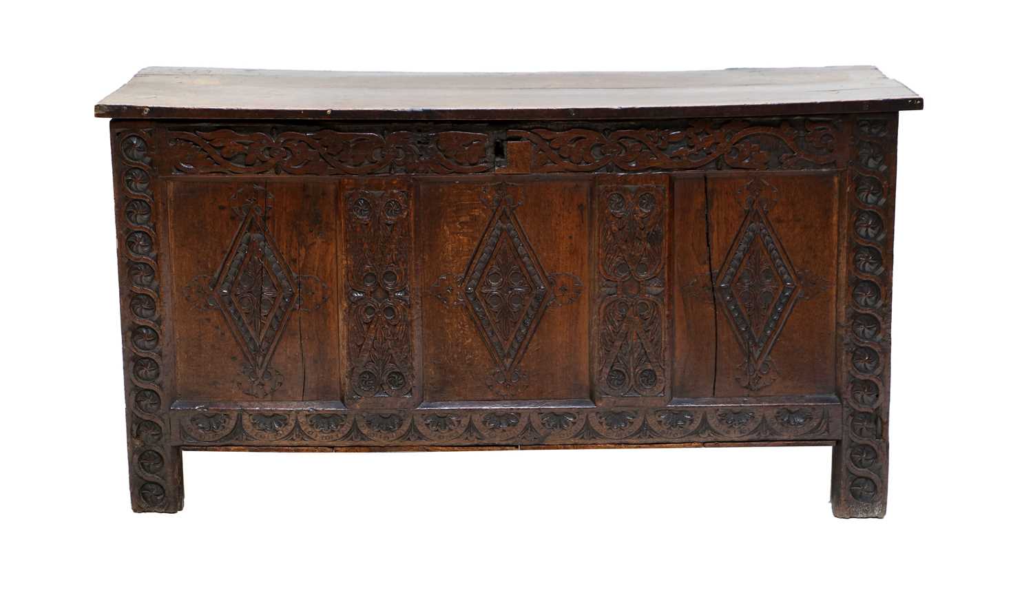 An late 17th/Early 18th century Oak Coffer, hinged lid, panelled front and sides, carved scroll - Image 2 of 3