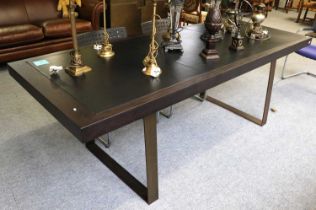 A Modernist Stained and Faux Leather Inset Dining Table, on brushed metal supports, 230cm by 90cm by