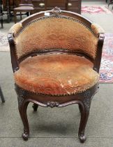 An Early 20th century Mahogany Framed Swivel Tub Chair, padded back and arms, over stuffed seat with