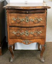 A 19th century Dutch Walnut and Crossbanded Dressing Chest, of serpentine form with brushing slide