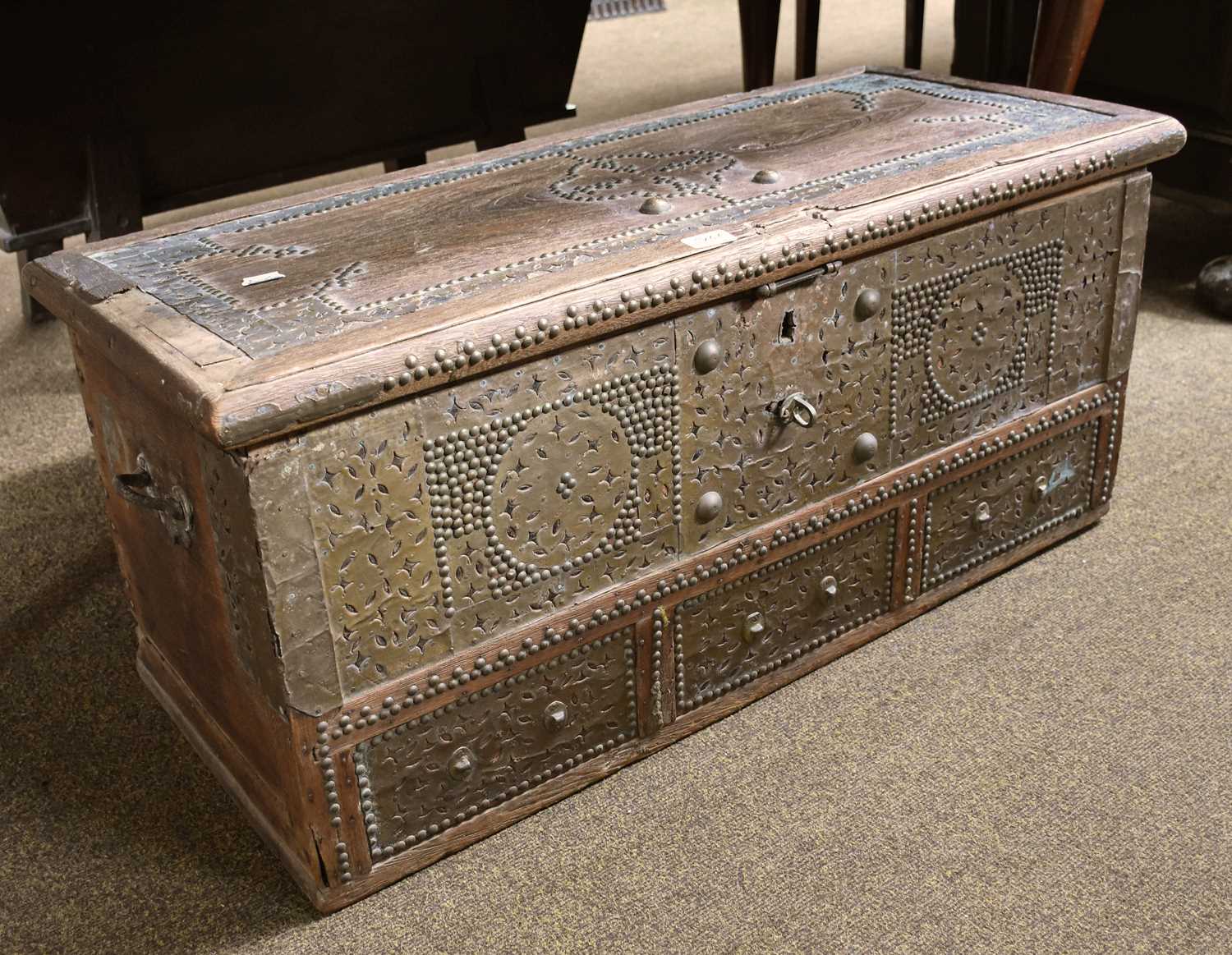 A Maltese Camphor Wood Chest, with stud work and brass mounts, hinged lid, candle box to interior,