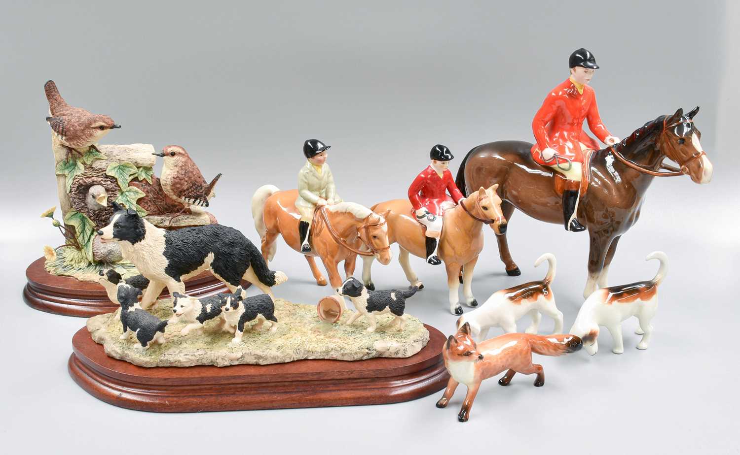 Beswick Hunting Group, including Huntsman, Boy on Pony, Foxes and Fox Hounds; together with