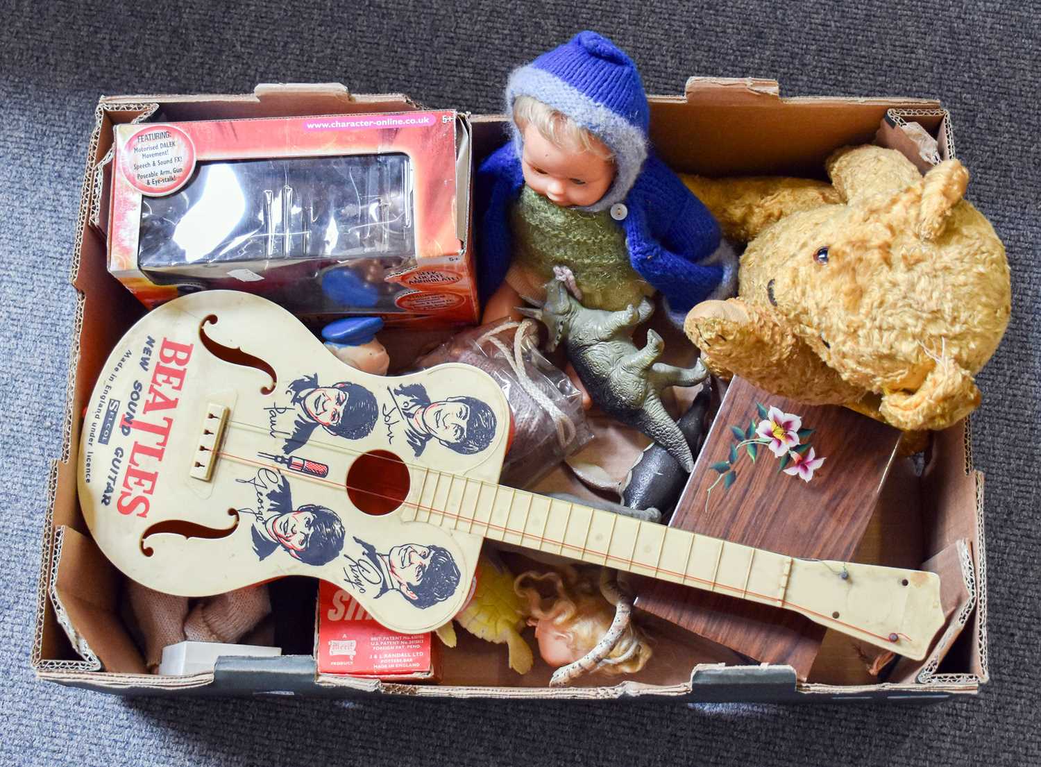 A Small Quantity of Toys Including, Beatles plastic guitar, a boxed Dr Who radio controlled dalek,