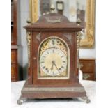 An Oak Cased Table Clock, twin train eight day movement, arched Roman dial, gilt mount, 42cm high