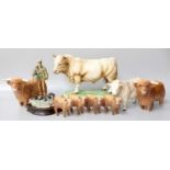 Beswick Cattle, including Highland Bulls and Calves and a Charolais Bull; together with a foreign