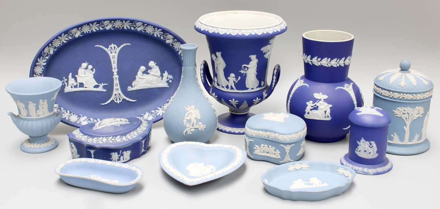 A Group of 19th Century and Later Wegwood Jasper Ware, including a campana form urn, trinket dishes,