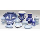 A Group of 19th Century and Later Wegwood Jasper Ware, including a campana form urn, trinket dishes,