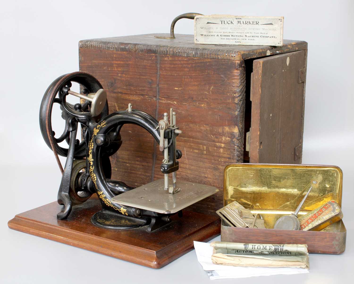 A Victorian Willcox & Gibbs Sewing Machine, and accessories