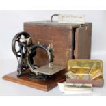 A Victorian Willcox & Gibbs Sewing Machine, and accessories